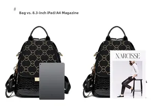 Size comparison of black crocodile pattern backpack with 8.3 inch iPad and A4 magazine