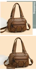 Detail view of brown washed leather motorcycle bag with rivets and woven leather texture