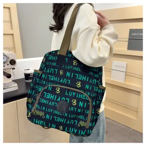 Versatile crossbody backpack with green letter print and yellow graphics on black nylon