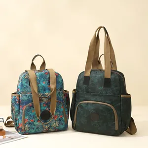 Waterproof nylon backpack with vintage prints and multi-pocket design for outdoor use