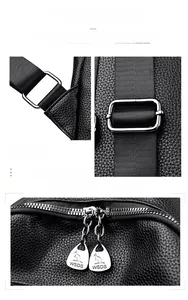 Close-up of premium silver hardware and leather texture on an embroidered backpack