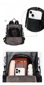 Vue détaillée de l'ouverture antivol au dos et du grand intérieur du sac à dos en cuir noir