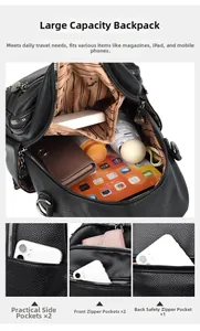 Detail view of the black lychee grain leather backpack showing multiple zipper pockets