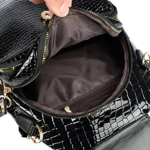 Black crocodile pattern backpack for women with sparkling rhinestones and gold hardware