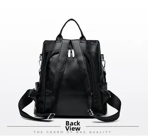 Vue arrière du sac à dos en cuir noir montrant les bretelles et détails antivol