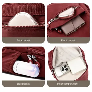 Vista detallada de la mochila granate mostrando múltiples bolsillos y compartimentos de carga