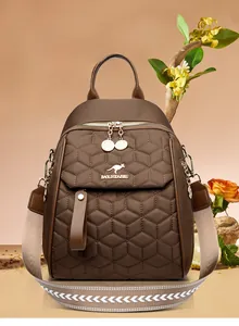 Detail of brown quilted backpack with kangaroo logo and woven patterned strap