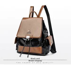 Detail view of the black and yellow leather backpack with metal clasp and drawstring