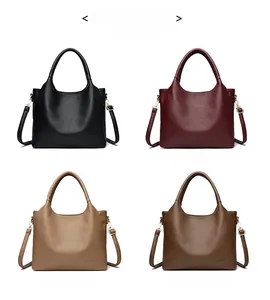 Litchi pattern leather handbags in black, red, khaki, and caramel with gold hardware
