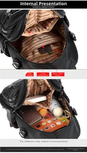 Detailed interior of black leather backpack showing laptop sleeve and multi-pocket storage