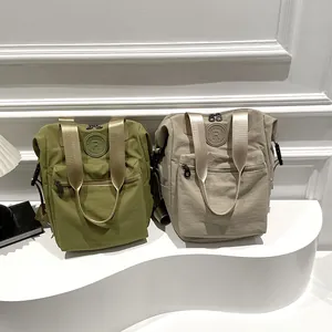 Waterproof nylon backpack in olive green and beige with large capacity and multi-pockets