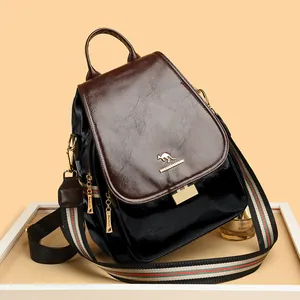 Chic leather backpack for women with colorful striped straps and flap cover