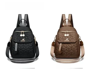 Quilted diamond pattern backpacks in black and brown with wide shoulder straps