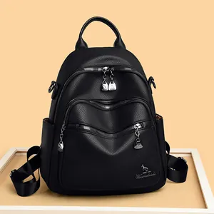 Elegant black lychee grain leather backpack for women with embroidery and dual front zippers