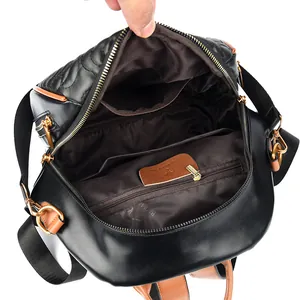 Zaino trapuntato in pelle PU nera con profili marroni e ricami floreali eleganti