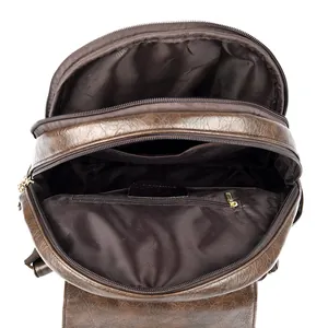 Mochila vintage de cuero encerado marrón oscuro con amplio interior compartimentado