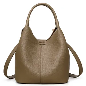 Olive green bucket bag in pebble leather with top handle and shoulder strap