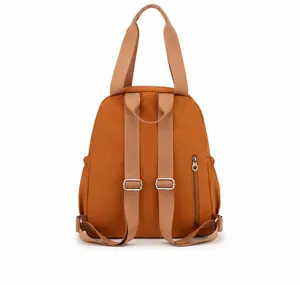 Rückansicht des bernsteinfarbenen Nylon-Rucksacks mit Diebstahlsicherung und Gurten