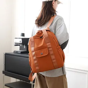 Leuchtend oranger wasserdichter Nylon Rucksack für Damen stilvolle Freizeittasche