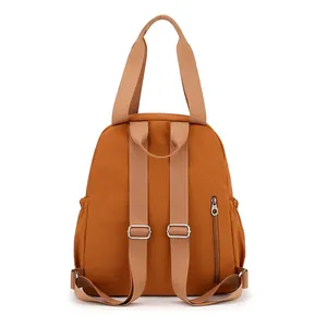 Wasserfester Nylonrucksack in Orange mit verstellbaren Riemen und verstecktem Fach
