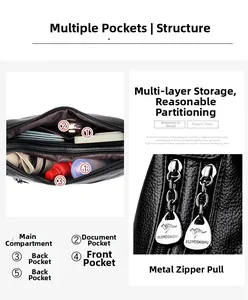 Detail view of black pebble leather shoulder bag showing five internal storage pockets