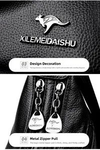 Macro shot of silver kangaroo metal logo and double teardrop zippers on lychee grain leather