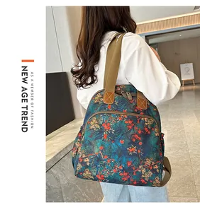 Floral vintage backpack with large capacity and adjustable brown straps on model