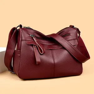 Classic burgundy multi-pocket leather crossbody bag with lychee texture and soft structure