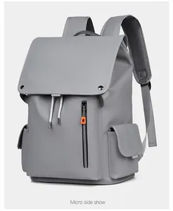 Détail latéral du sac à dos gris anthracite imperméable avec zip orange dynamique