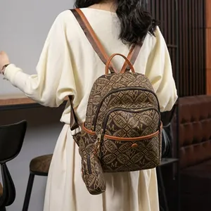 Mochila retro de cuero PU marrón para mujer con estampado de letras y pequeño monedero