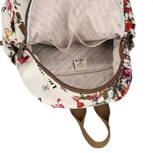 Floral vintage backpack with large capacity showing spacious interior and logo lining