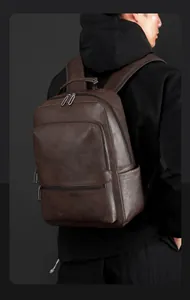 Detail view of brown vintage leather business backpack with large storage and premium texture
