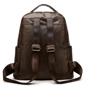 Sac à dos moto en cuir marron vintage avec rivets et bretelles réglables robustes
