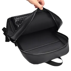 Sac à dos professionnel en cuir tressé noir avec compartiment ordi et bretelles textiles