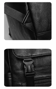 Detail of leather backpack showing triangular strap reinforcement and buckle closure