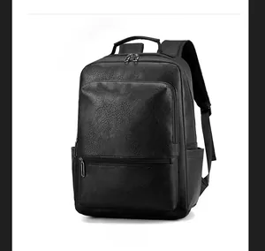 Side view of black business backpack showing premium lychee grain leather texture