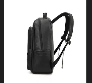 Side view of vintage black leather business backpack showing spacious compartments and side pocket