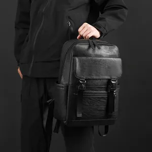 Sac à dos professionnel en cuir noir grainé avec boucles à rabat et poche latérale à eau