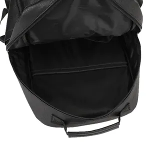 Black leather business backpack showing spacious interior compartment and fabric lining
