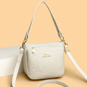 Women Genuine Leather Bucket Bag Floral Relief Embossed Shoulder Crossbody Bag With Golden Kangaroo Logo Elegant Handbag