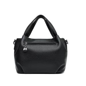 Black leather handbag with lychee texture featuring double handles and kangaroo charm