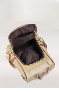 Internal view of high capacity khaki canvas backpack showing spacious main compartment