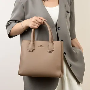 Elegant khaki lychee grain leather tote bag with gold logo shown from a front angle