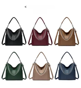 Multicolor leather bucket bags in six shades featuring metal chain and kangaroo logo
