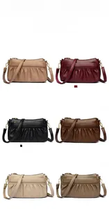 Detailed grid of six solid color leather crossbody bags with ruched texture and gold zippers