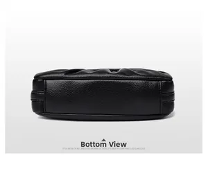 Detailed bottom view of black pebble leather handbag with premium pleated side structure