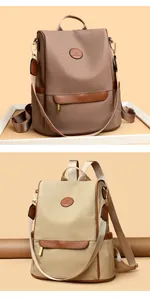 Detail of high-density nylon backpacks in brown and beige with leather trim and kangaroo logo