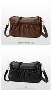 Close-up of leather crossbody bags with ruched design and gold metal zippers