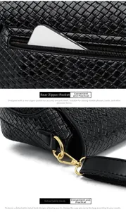 Detail of anti-theft zipper pocket and detachable golden metal hook on black leather bag