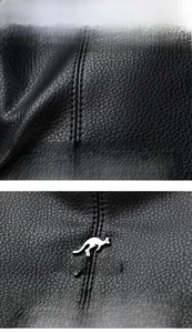 Detail of premium black leather texture with durable metal kangaroo logo on a bucket bag